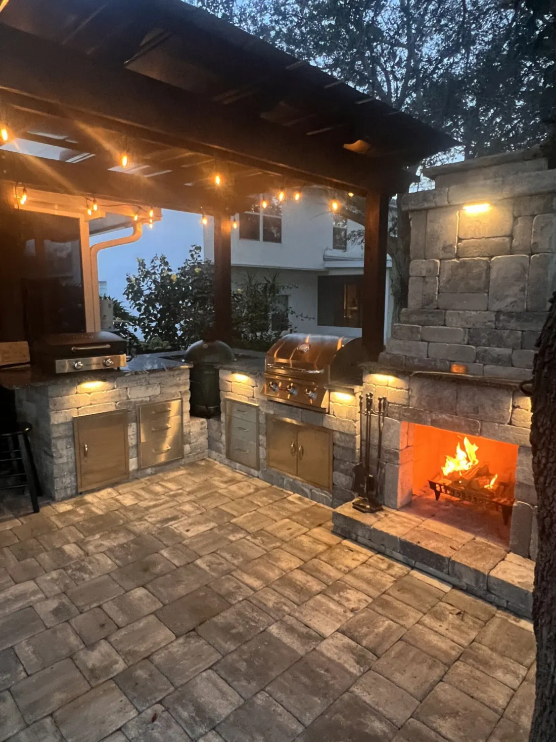 Outdoor kitchen and paver installation by M & C Pavers.